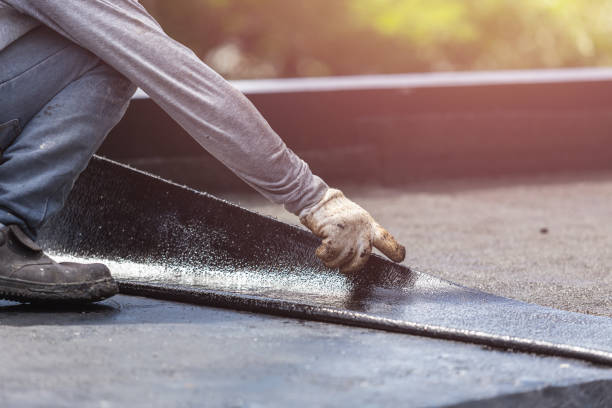 Professional Exterior Waterproofing technician working in West Sayville, NY